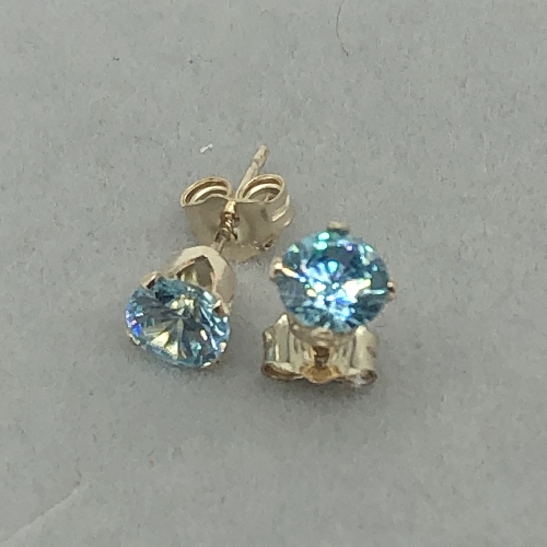 Gold Buttercup Studs with CZ Stones in Light Blue | SilverTales | Hand Crafted Jewellery